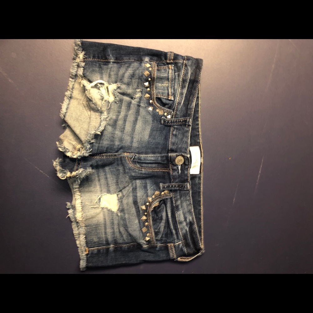 Express studded and distressed denim jeans